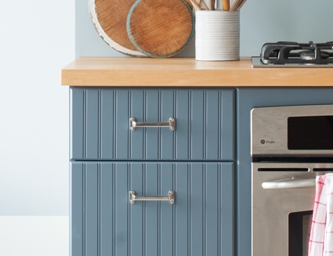Repainted blue kitchen cabinets. Repainted blue kitchen cabinets.